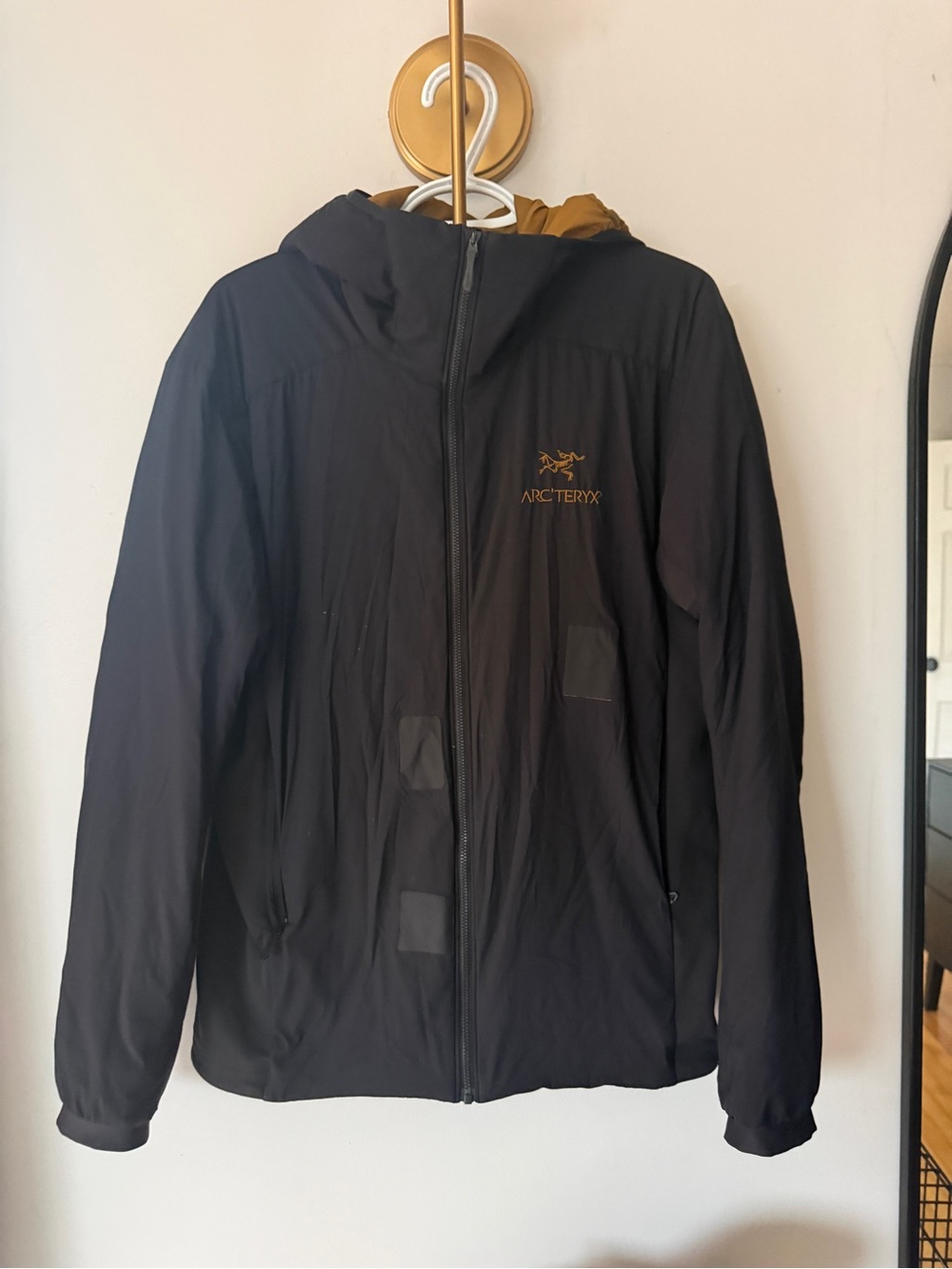 Arc'teryx Men's Black Jacket with Gold Logo and Hood